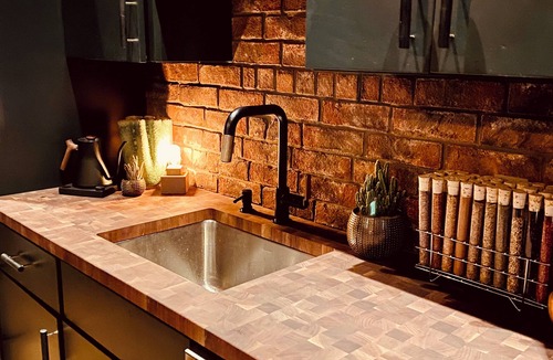 Fort Point Apartment | Fort Point Corner of Windows brick & beam loft