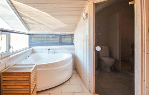 Torup Strand House | Four-Bedroom Holiday Home In Fjerritslev
