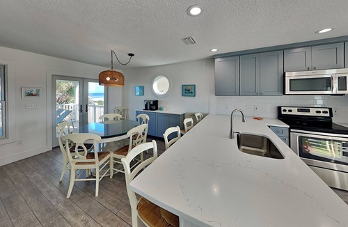Crescent Beach Cottage | Four Palms by Distinctive Beach Rentals