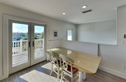 Crescent Beach Cottage | Four Palms by Distinctive Beach Rentals