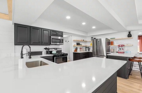 Commerce Township House | Fox Lake Retreat | Dock, Hot Tub, Sauna & Gameroom