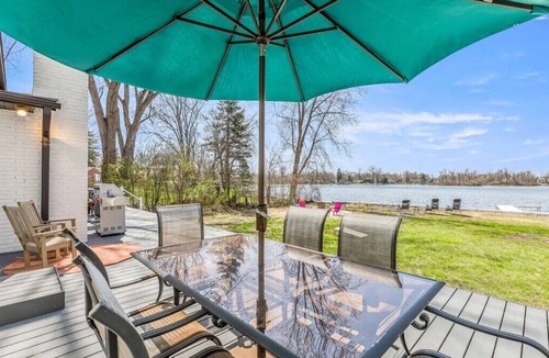 Commerce Township House | Fox Lake Retreat | Dock, Hot Tub, Sauna & Gameroom