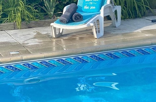 Serigny House | French Gem: Rustic Cottage, Poolside Bliss