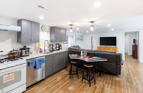 Orange House | Fresh 2BR Duplex Pets Welcome