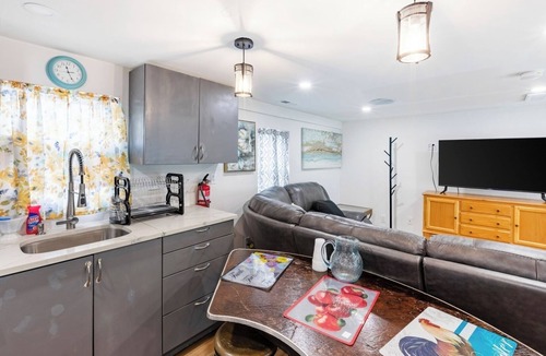 Orange House | Fresh 2BR Duplex Pets Welcome