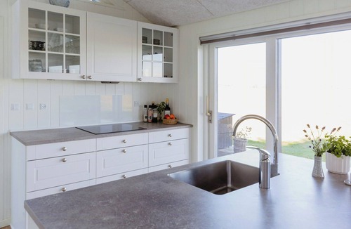 Fynshav House | Fresh air on open terrace with view