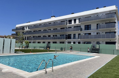 Vallpineda Apartment | Frontline apartment with pool & parking and incredible views on quiet beach