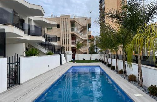 Santiago de la Ribera Apartment | Frontsea Beach bungalow with swiming pool and long terrace