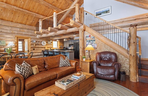 Baldwin Cabin | Full Scribed Log Cabin Nestled in along the banks of the Pere Marquette