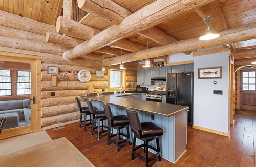 Baldwin Cabin | Full Scribed Log Cabin Nestled in along the banks of the Pere Marquette