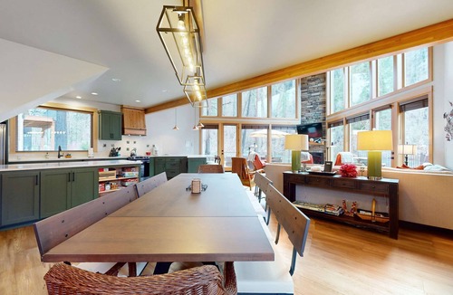 Vida House | Fully rebuilt riverfront home with deck, fireplace, & W&D - dog-friendly