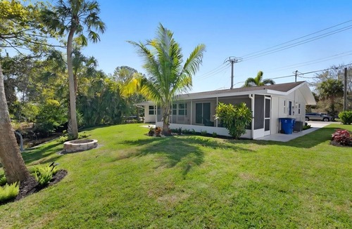 Bonita Springs House | Fully remodeled 3/2.5+ outdr.shower, set on a tropical creek in downtown Bonita!
