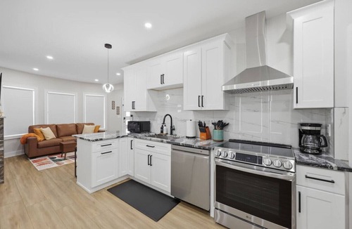 Detroit Apartment | Fully Renovated Sleeps 10 | Game Room | 2 Kitchens