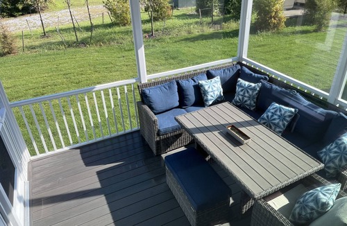 Cedar Neck House | Fun family vacation spot! 4 Bedrooms, Screened in Back Porch, Large Family Room.