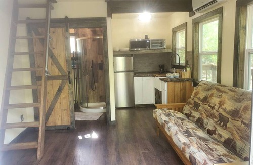 Waller Cabin | Fun for All Ages: Treehouse with Waterfront Deck for Families in Grimes County, TX
