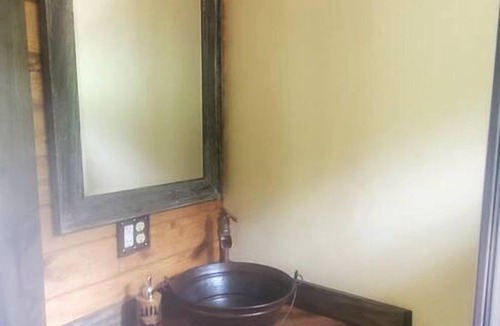 Waller Cabin | Fun for All Ages: Treehouse with Waterfront Deck for Families in Grimes County, TX