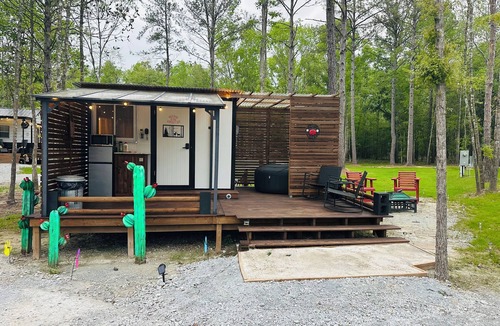 Kountze Apartment | Fun little get away, perfect for one yet cozy for two “Hunter’s Hut”