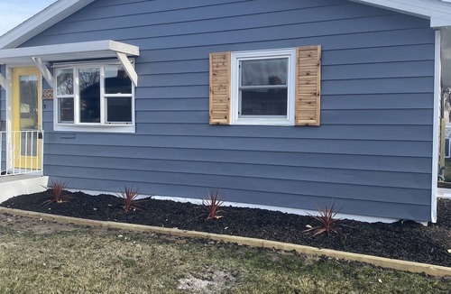 Ogallala House | Fun MidMod home remodeled with private back yard.