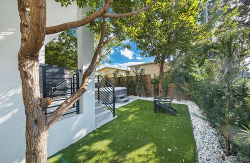 Allapattah Condo | Fútbol-Themed Home with Hot Tub