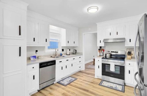 North Charleston House | Game Room Fireplace Backyard Deck Fire Pit Pets