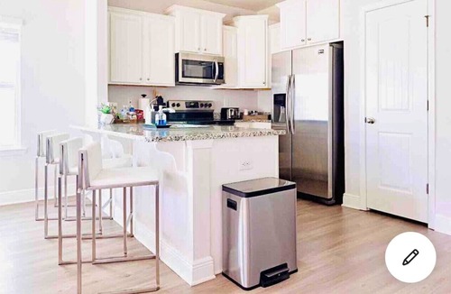 Upper Grand Lagoon House | Game Room, mins to beach, Pier Park and Sports Complex, POOL, pond view