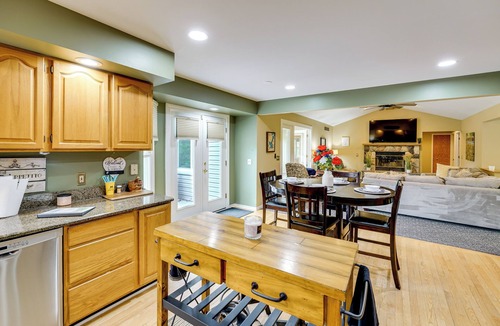 Commerce Township House | Game Room & Fire Pit: Canal-Front Commerce Home