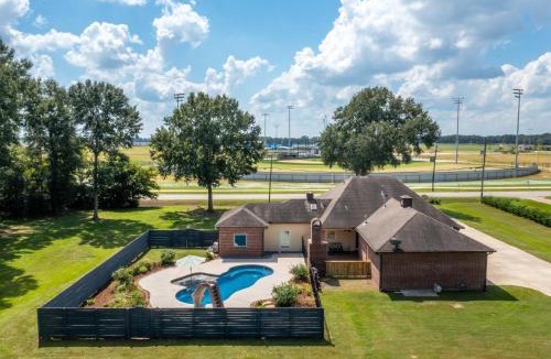 Youngsville House | Gameday Getaway - Pool - King Bed - Sports Complex