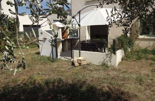 Ganges Apartment | Garden apartment, terrace with BBQ, swimming pool.