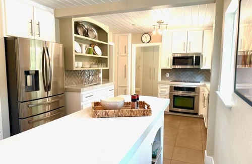Carmichael House | Garden Oasis Contemporary Condo