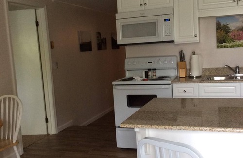 Westfield Apartment | Garden View Deck Private Unit. Historic 1830's Updated unit wi/fi, AC, Smart TV