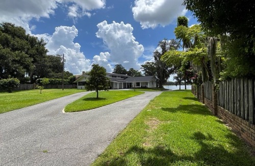 Edgewood House | Gated Lakefront Estate,Central Location on an acre with Boat ramp, and more