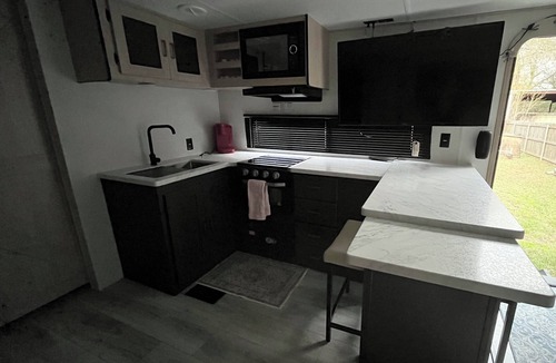 Crockett House | Get Cozy in Crockett with a Relaxing Stay in a 4 Person RV- Outdoor Fireplace