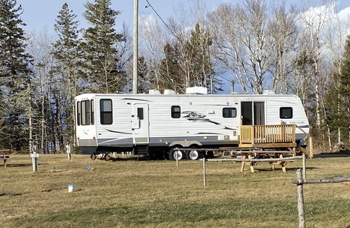 Tabusintac House | Glamping enthusiasts! Explore nature from this river view RV accommodation