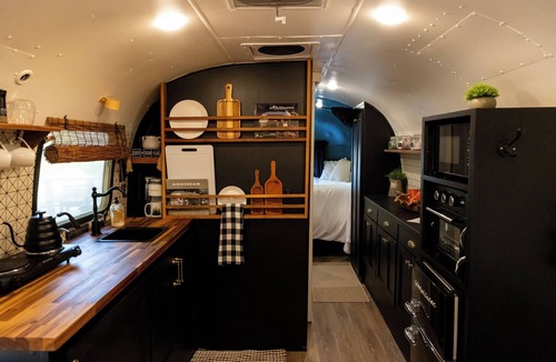 Honey Grove Apartment | Glamping in a remodeled Airstream in the Woods