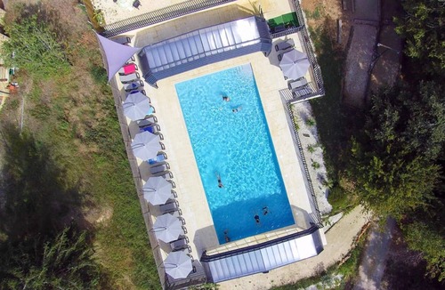 Calviac-en-Perigord RV Rental | Glamping “Safari Tent” with Shared Pool