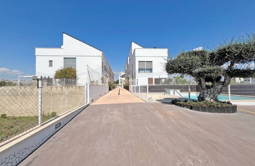 Playa de Almarda House | Global Properties: Townhouse with terrace and pool in Almenara Beach