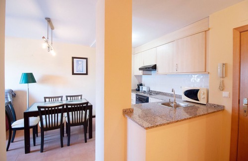 Playa de Almarda Apartment | Global Vacacional: Apartment with pool on Corinto beach
