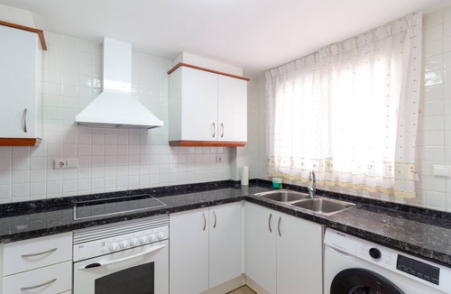Playa de Almarda Ski Chalet | Global Vacacional: Front line beach townhouse with sea views