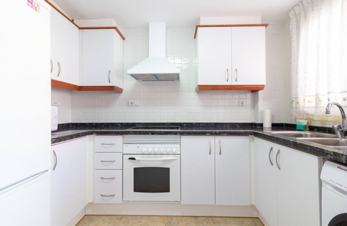 Playa de Almarda Ski Chalet | Global Vacacional: Front line beach townhouse with sea views