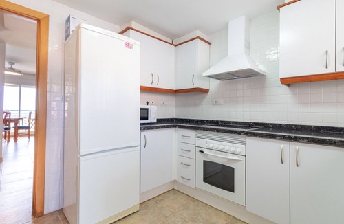 Playa de Almarda Ski Chalet | Global Vacacional: Front line beach townhouse with sea views