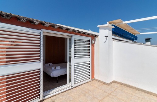 Playa de Almarda Ski Chalet | Global Vacacional: Front line beach townhouse with sea views