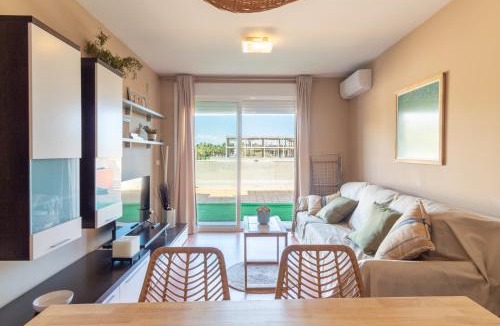 Playa de Almarda Apartment | Global Vacacional, Planta baja con piscina en Almenara