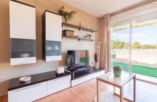 Playa de Almarda Apartment | Global Vacacional, Planta baja con piscina en Almenara