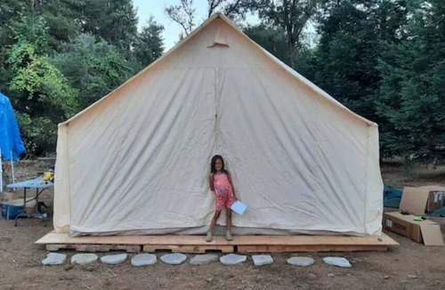 Auburn RV Rental | Glow in the dark Pickleball and Glamping in 16x14 canvas tent with Queen setup