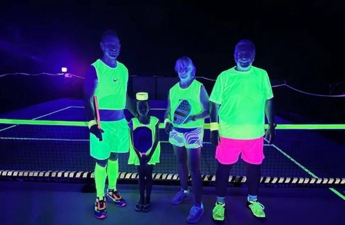 Auburn RV Rental | Glow in the dark Pickleball and Glamping in 16x14 canvas tent with Queen setup