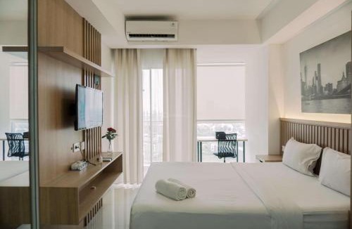 Pinang Apartment | Good and Homey Studio at Pacific Garden Alam Sutera Apartment By Travelio