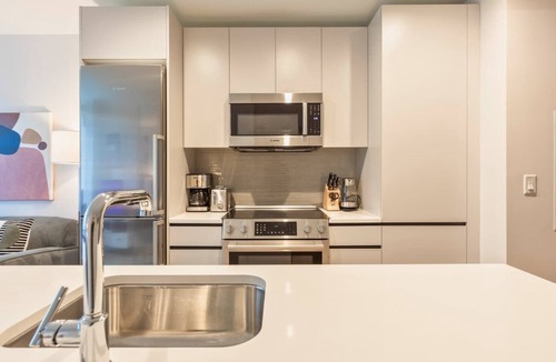 Seaport District Apartment | Gorgeous Apt with Pool Views