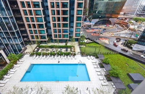 Seaport District Apartment | Gorgeous Apt with Pool Views