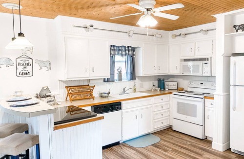 Pedernales Bend House | Gorgeous Farmhouse looking at Pedernales River