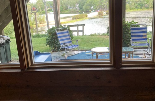East Harwich Apartment | Gorgeous lake beachfront private apartment with canoe, kayaks, & home theatre